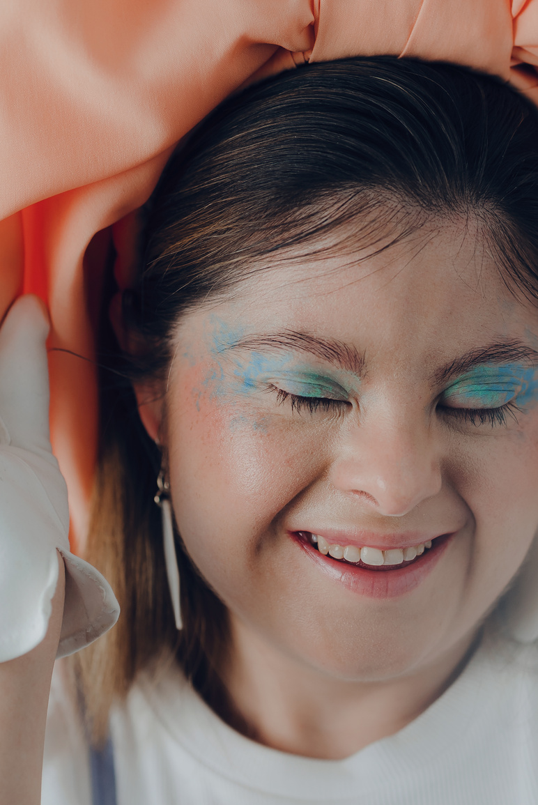 Closeup Portrait of Beautiful Woman with Down Syndrome